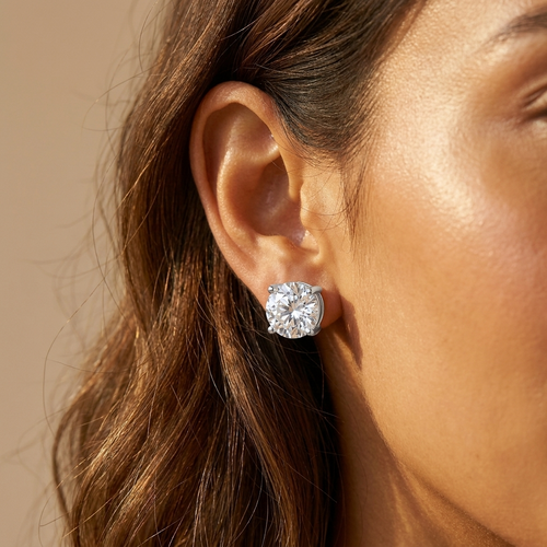 Silver CZ stud earrings worn close-up — waterproof by Pippa & Co