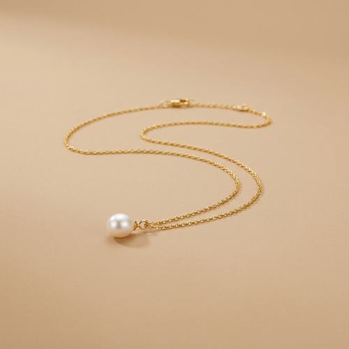 Gold pearl pendant necklace on a neutral background — waterproof tarnish-free