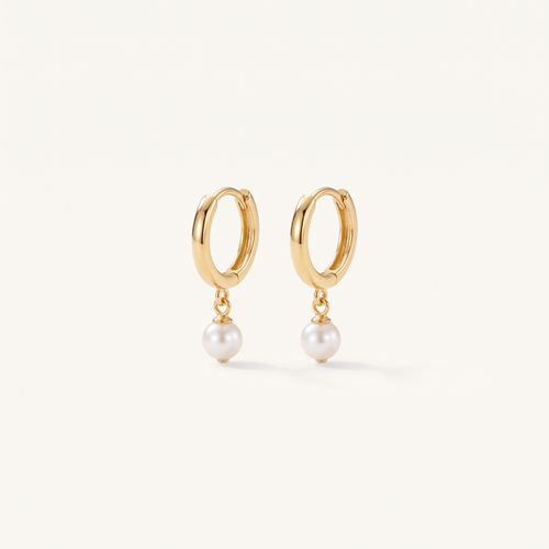Gold Pearl Huggie Hoops product studio shot