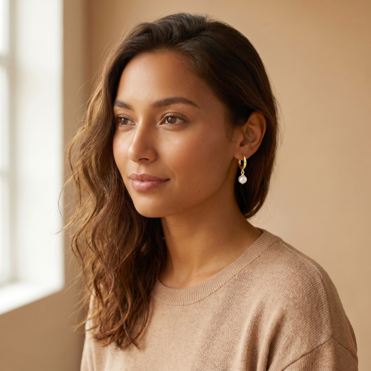Gold Pearl Huggie Hoops lifestyle worn