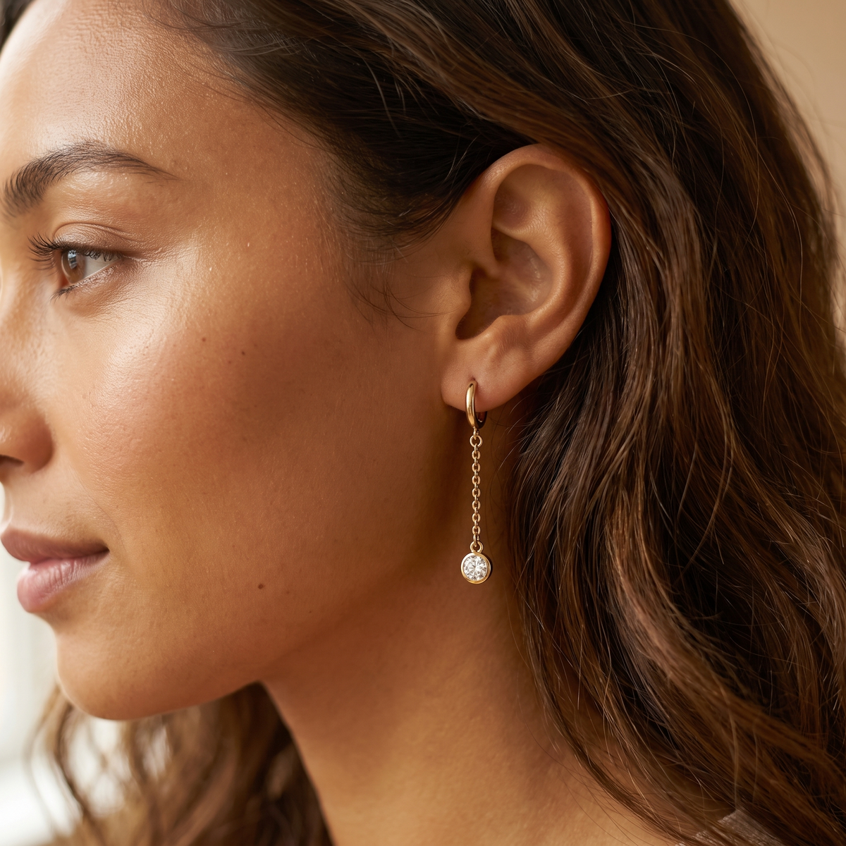 Gold CZ Drop Earrings worn close-up