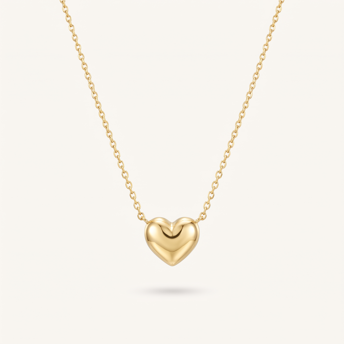 Gold Heart Pendant Necklace worn close-up