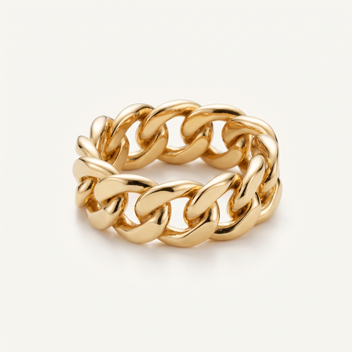 Gold chunky chain ring worn close-up