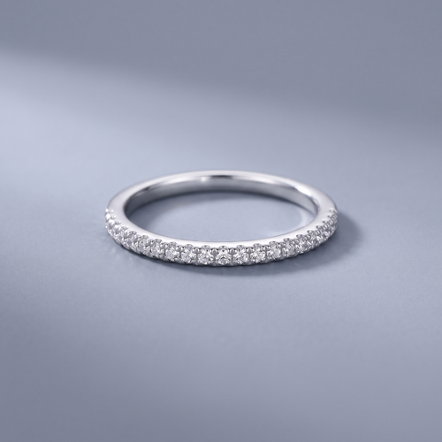 Silver CZ band ring worn close-up