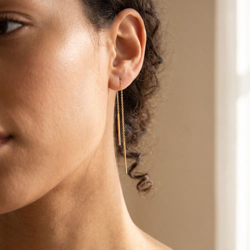 Gold threader earrings studio product shot