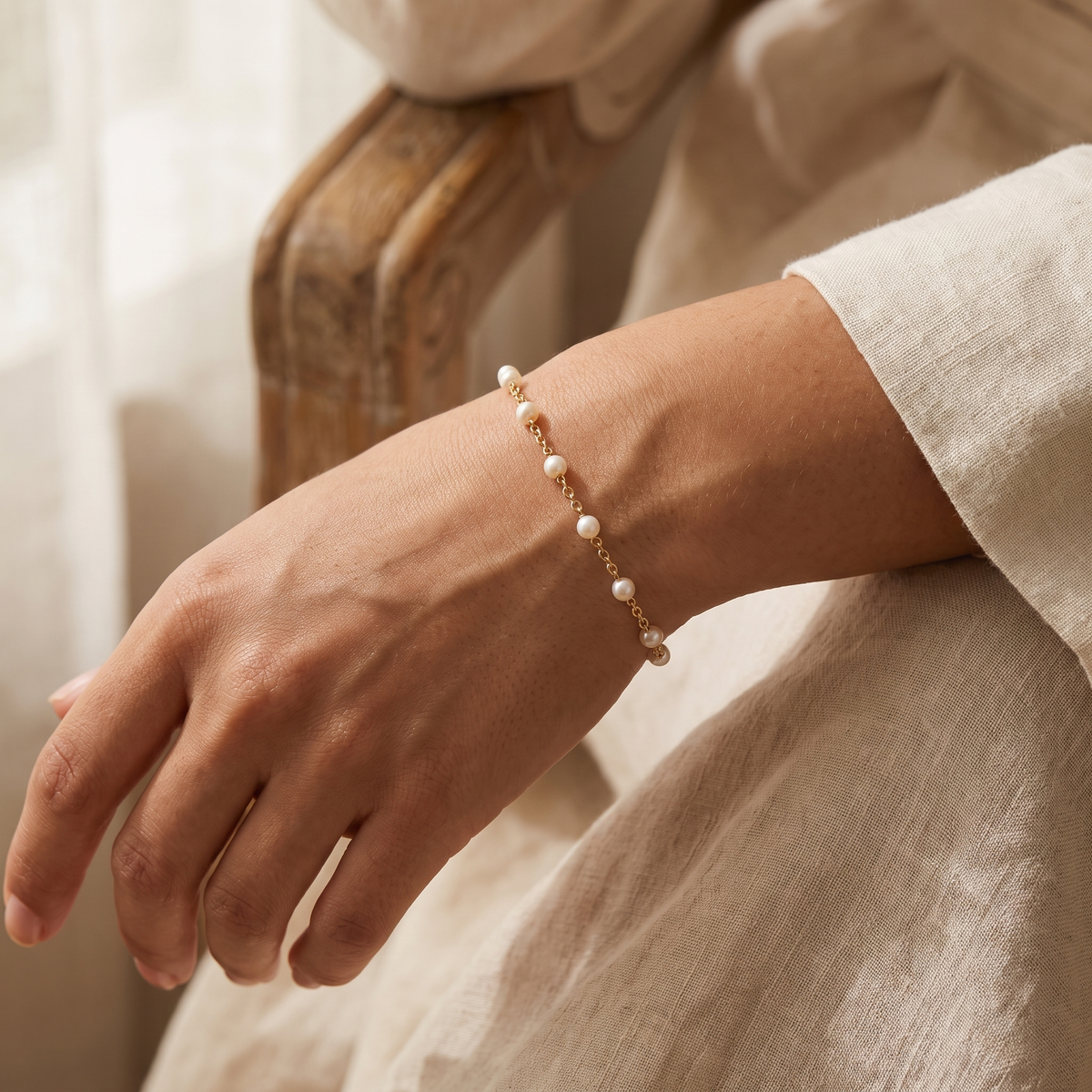 Gold pearl bracelet studio product shot